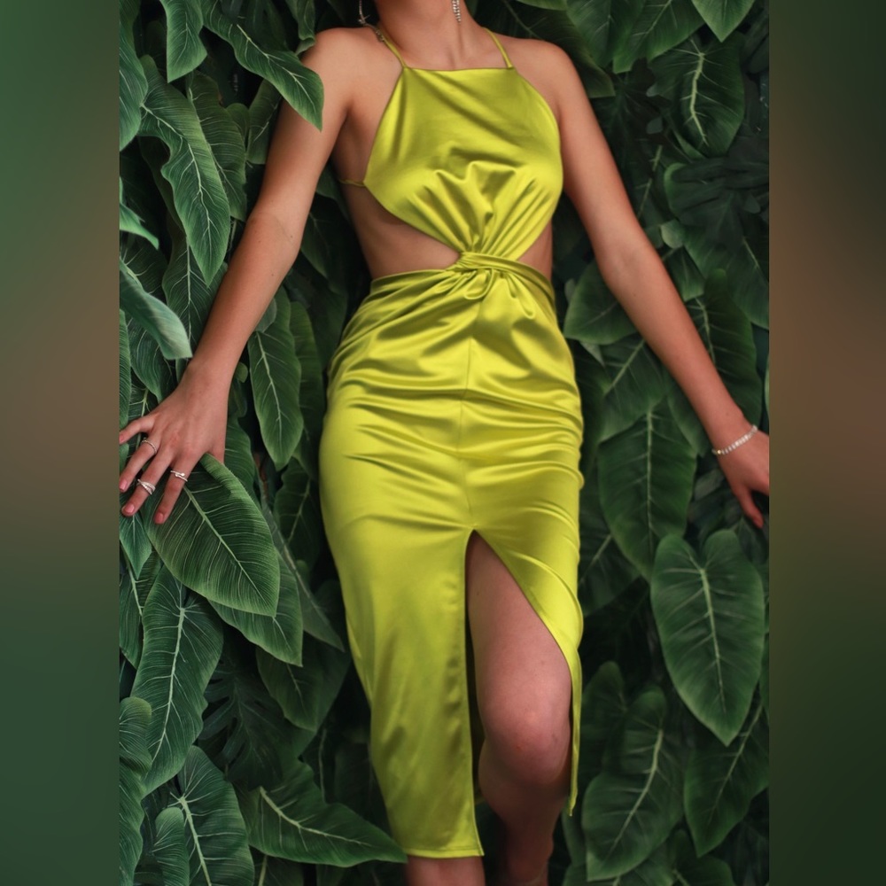 Backless dress. Available in sizes Small, Medium and Large.